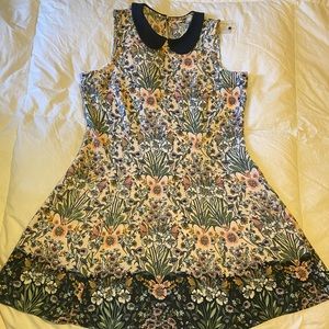 Adorable floral fit and flare dress with cute collar.